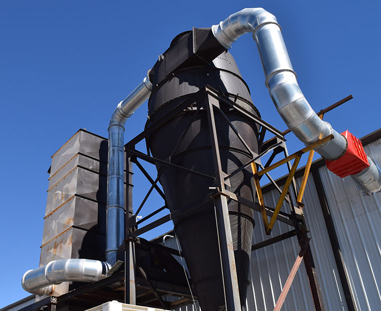 Nordfab heavy gauge ducting installed on dust collector at pallet manufacturing facility